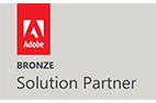 Adobe Bronze Solution Partner logo with the Adobe symbol and text 'Bronze Solution Partner'